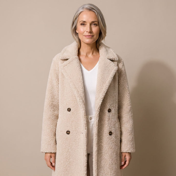 Lange Dames Winterjas in Teddy-Fleece in Beige
